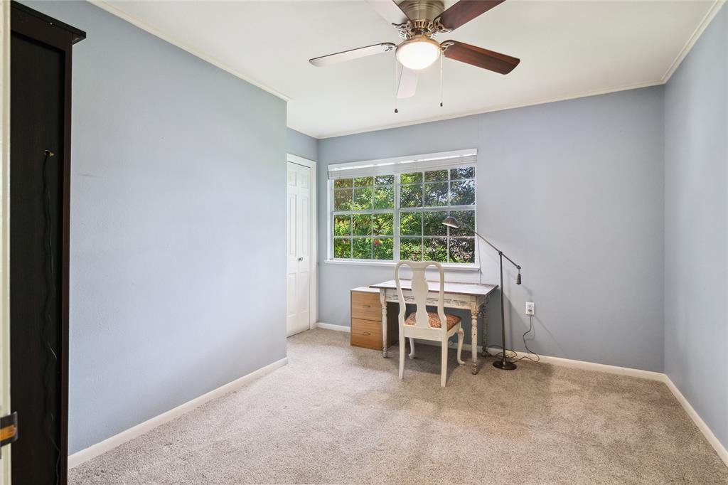4104 Evergreen Drive Waco, TX 76708 - Photo 27 of 36 a view of a workspace with furniture and a window