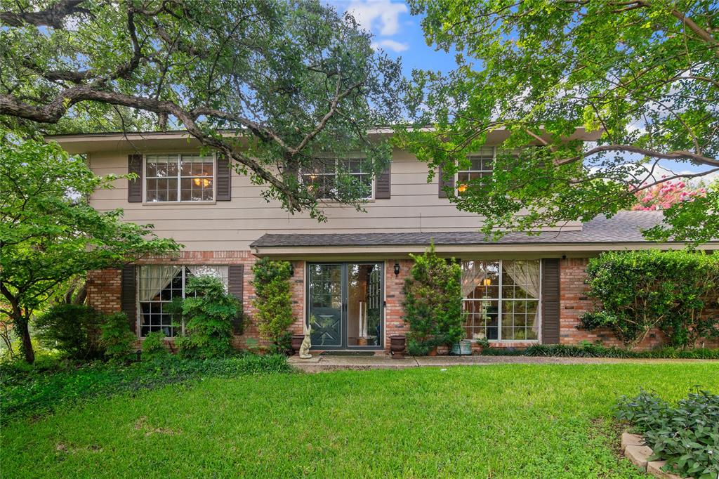 4104 Evergreen Drive Waco, TX 76708 - Photo 3 of 36 front view of a house with a yard
