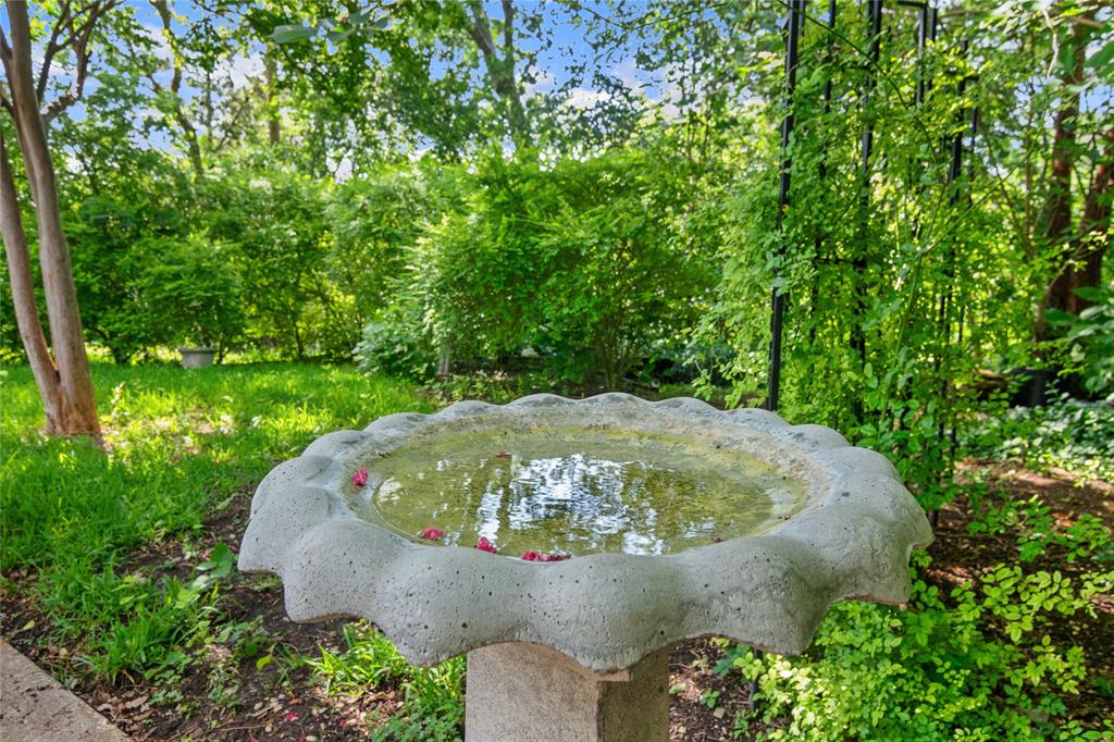 4104 Evergreen Drive Waco, TX 76708 - Photo 36 of 36 a view of a garden with a fountain