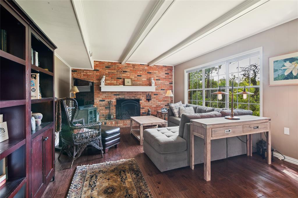 4104 Evergreen Drive Waco, TX 76708 - Photo 6 of 36 a living room with furniture fireplace and window