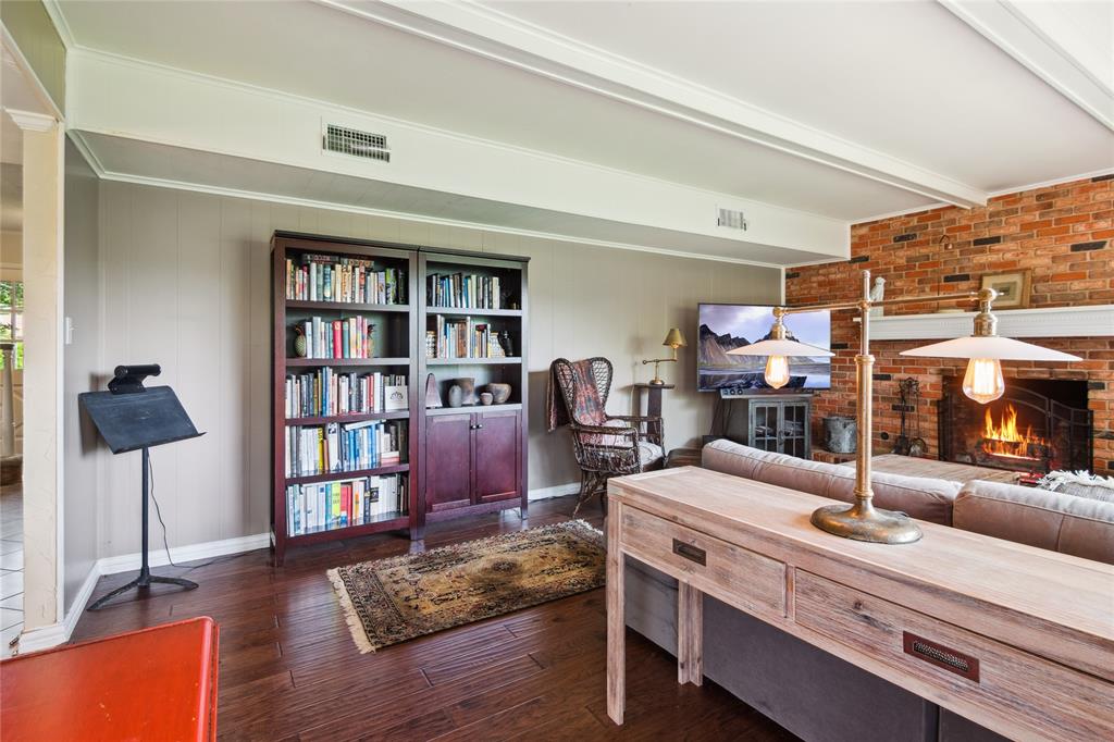 4104 Evergreen Drive Waco, TX 76708 - Photo 8 of 36 a living room with furniture and a book shelf