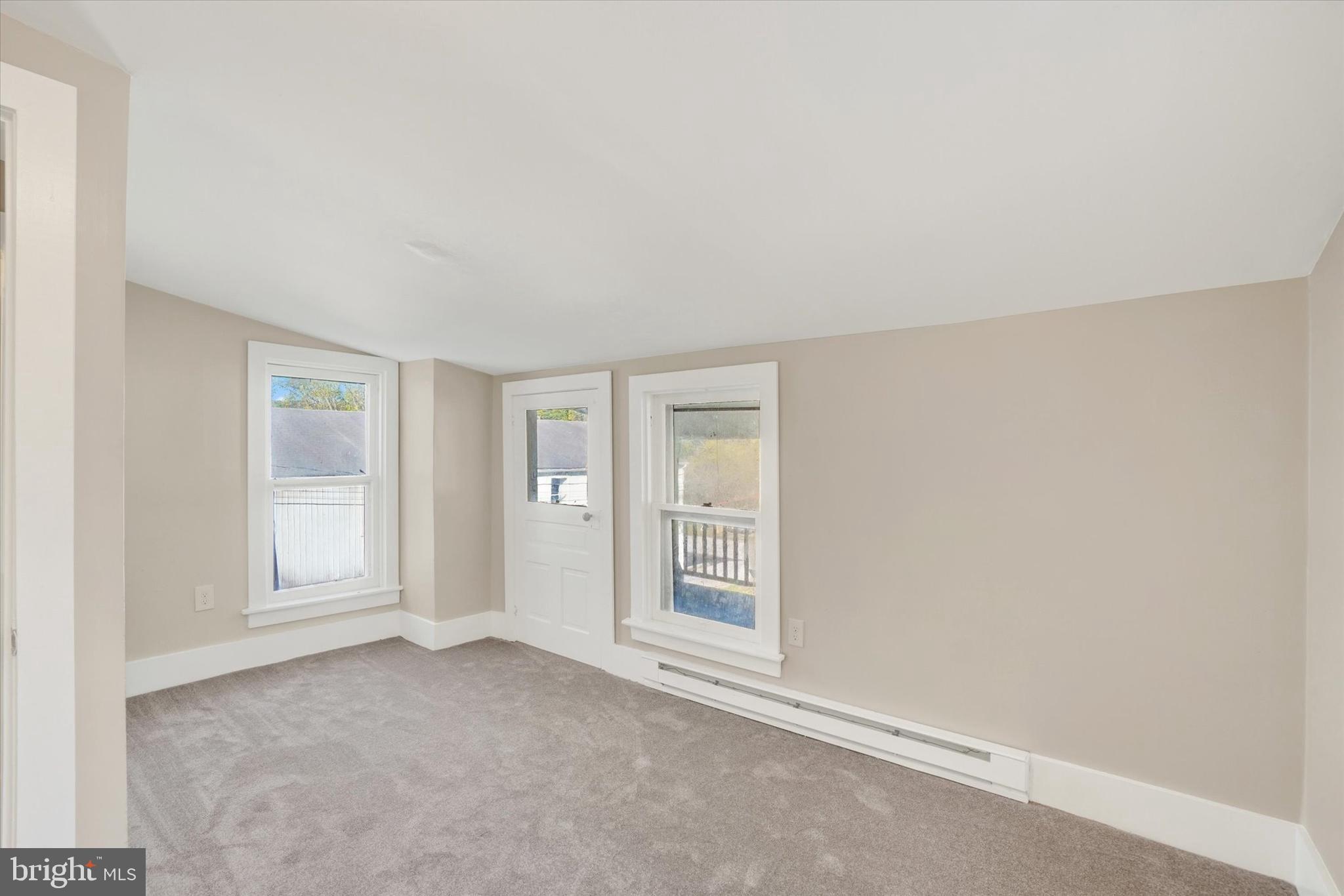 124 West Main Street Windsor, PA 17366 - Photo 12 of 24 an empty room with windows