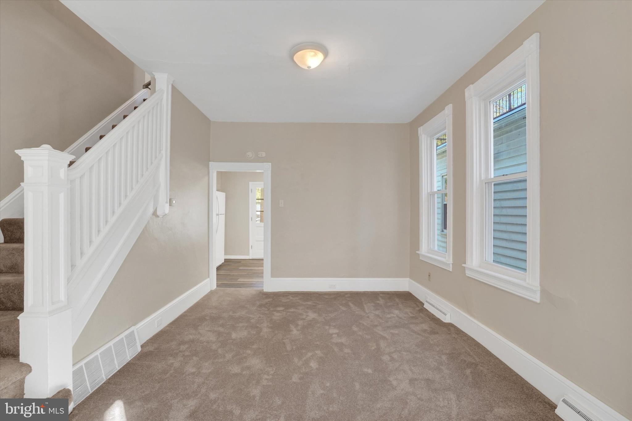 124 West Main Street Windsor, PA 17366 - Photo 4 of 24 a view of an empty room with a window