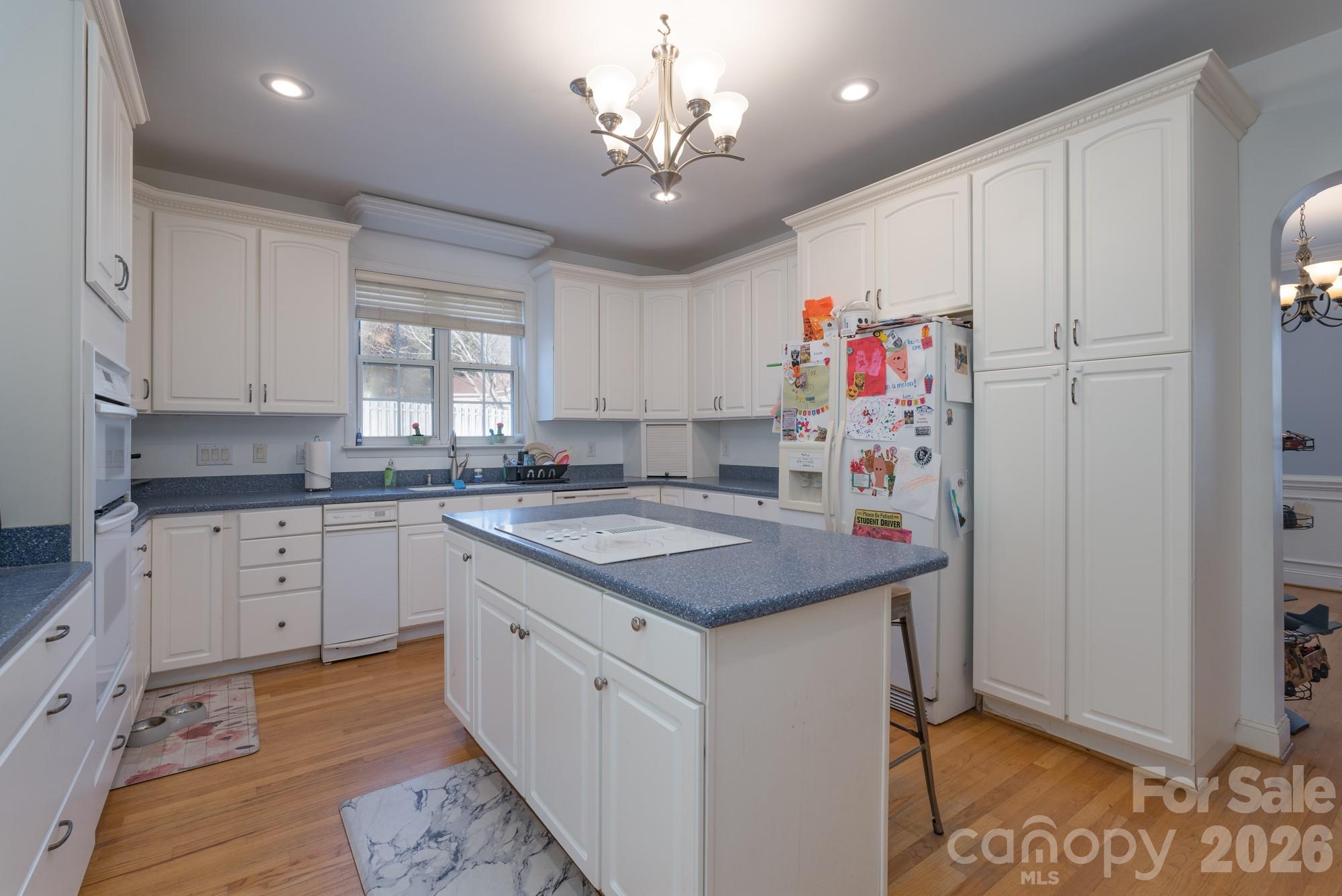 1491 Highway 160 Fort Mill, SC 29715 - Photo 13 of 19 a kitchen with stainless steel appliances granite countertop a sink stove and refrigerator