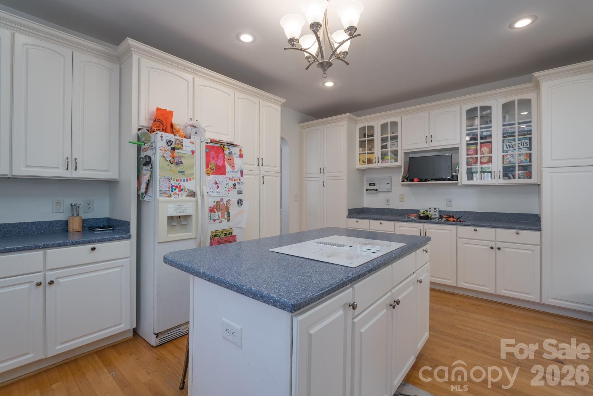 1491 Highway 160 Fort Mill, SC 29715 - Photo 14 of 19 a kitchen with granite countertop stainless steel appliances a stove refrigerator sink and microwave