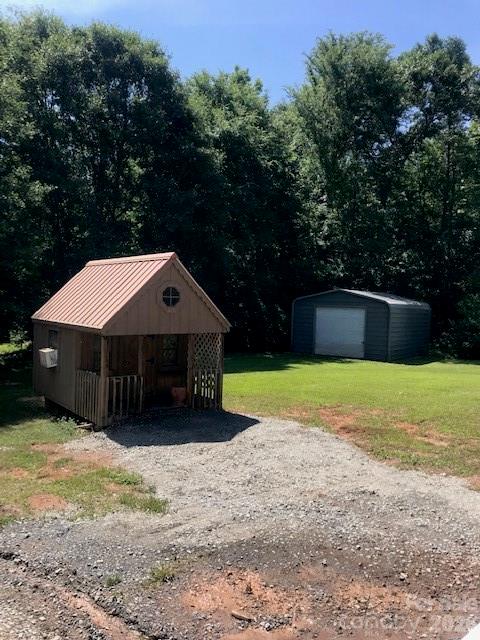 1491 Highway 160 Fort Mill, SC 29715 - Photo 18 of 19 a front view of a house with a yard