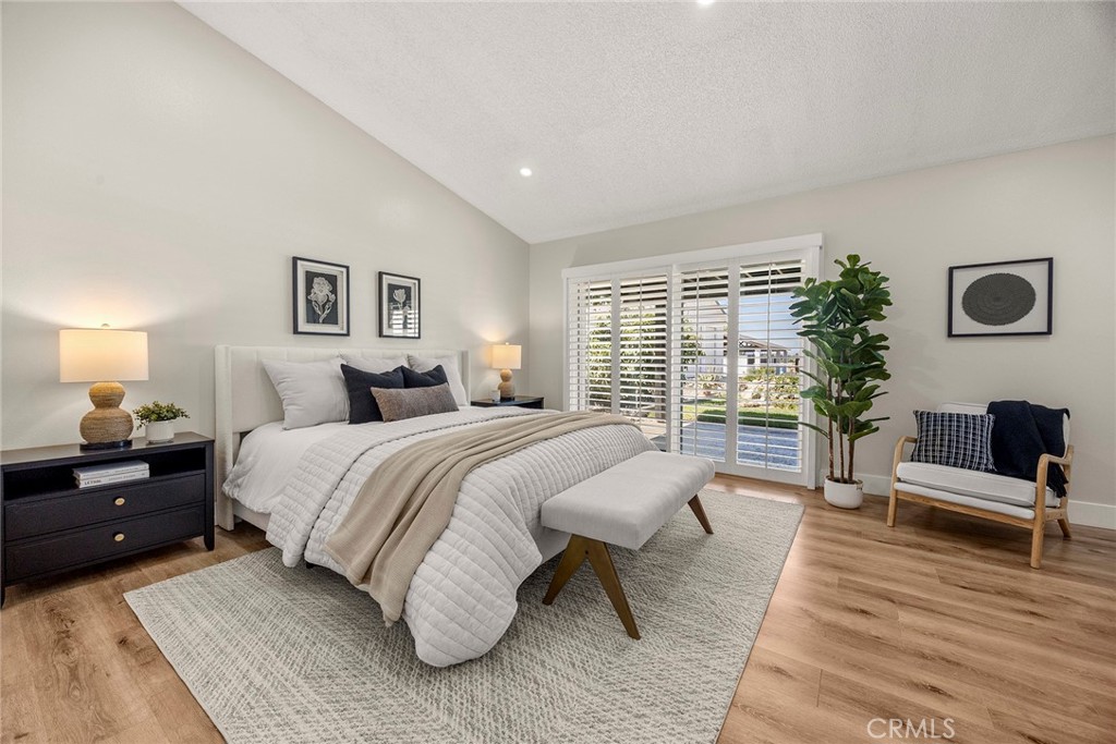 17411 Kaison Circle Riverside, CA 92508 - Photo 34 of 75 The primary bedroom has a west-facing slider that offers views as well as access to the above-ground spa