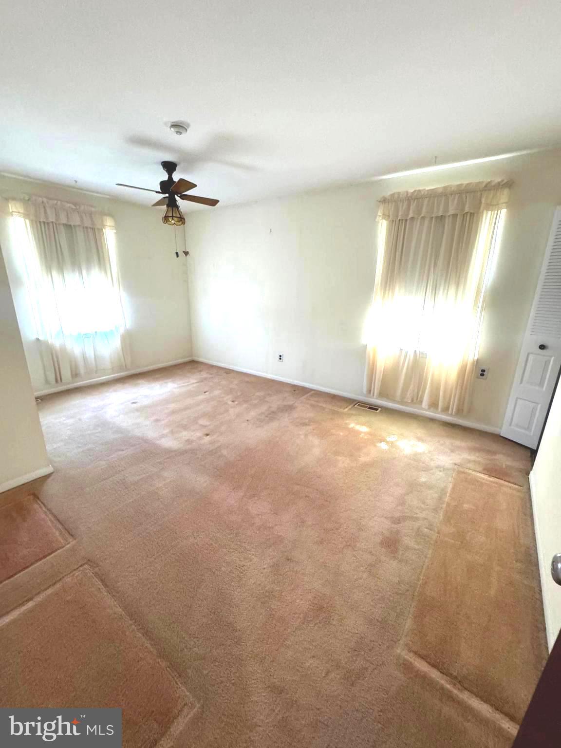 4741 River Road Pennsauken, NJ 08110 - Photo 20 of 26 a view of a livingroom with a ceiling fan and window