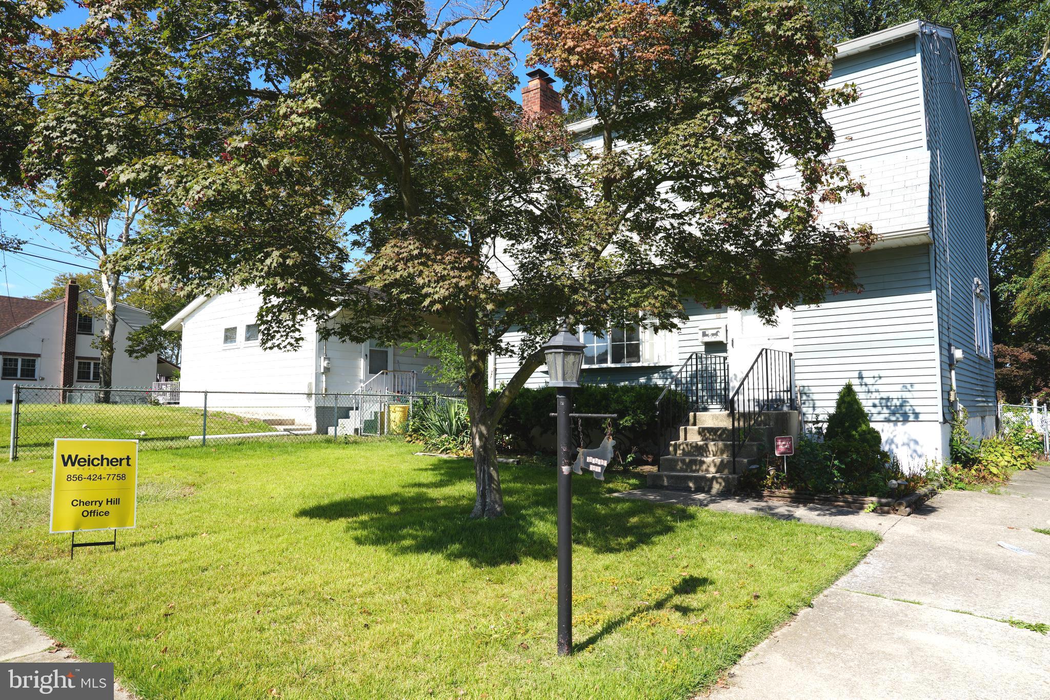 4741 River Road Pennsauken, NJ 08110 - Photo 26 of 26 a view of a fountain in front of a house with a fountain