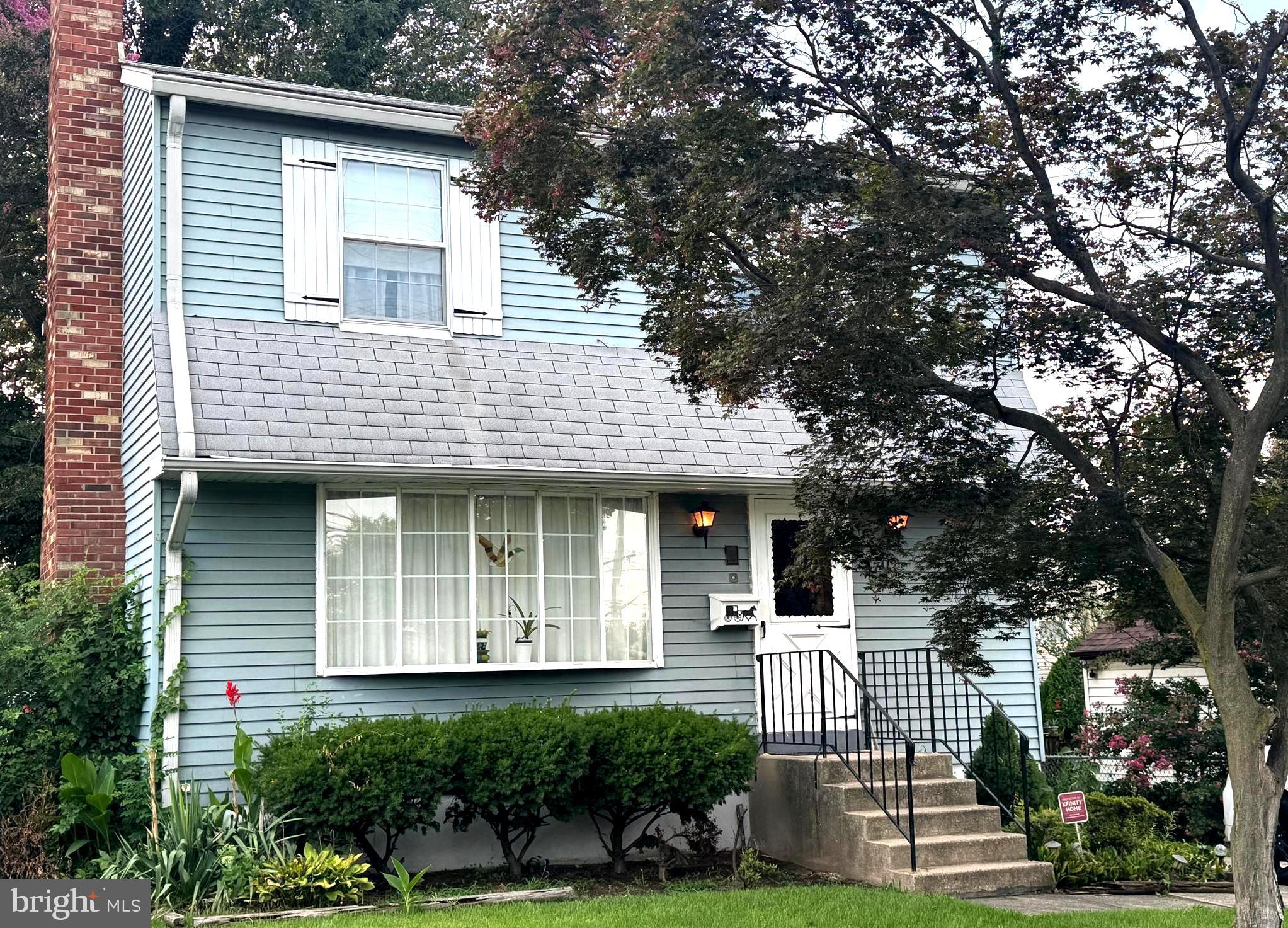 4741 River Road Pennsauken, NJ 08110 - Photo 3 of 26 a front view of a house with a garden