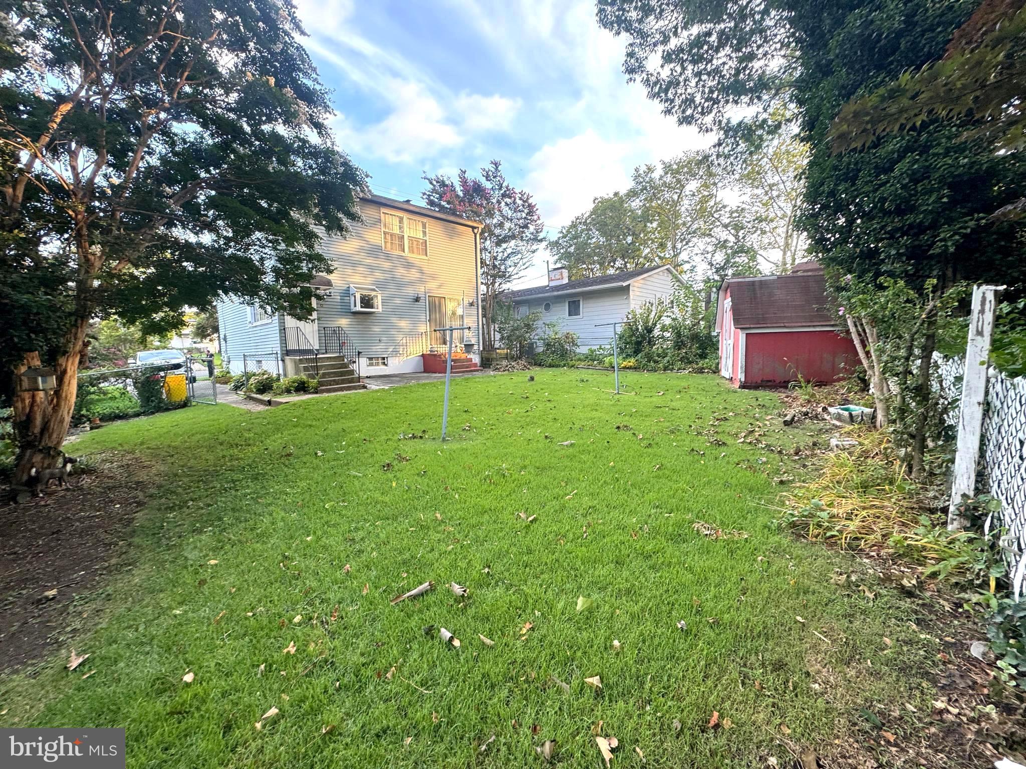 4741 River Road Pennsauken, NJ 08110 - Photo 4 of 26 a backyard of a house with table and chairs