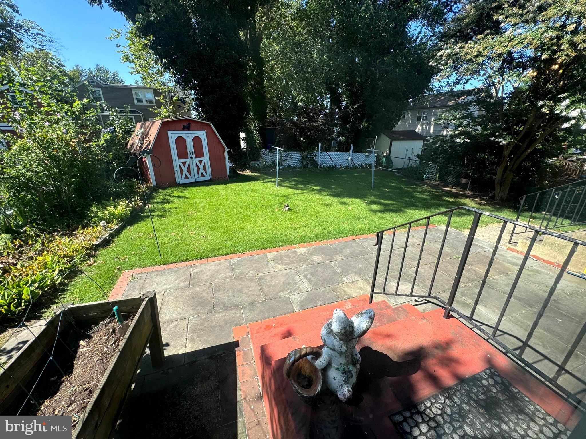 4741 River Road Pennsauken, NJ 08110 - Photo 5 of 26 a view of a backyard with a garden