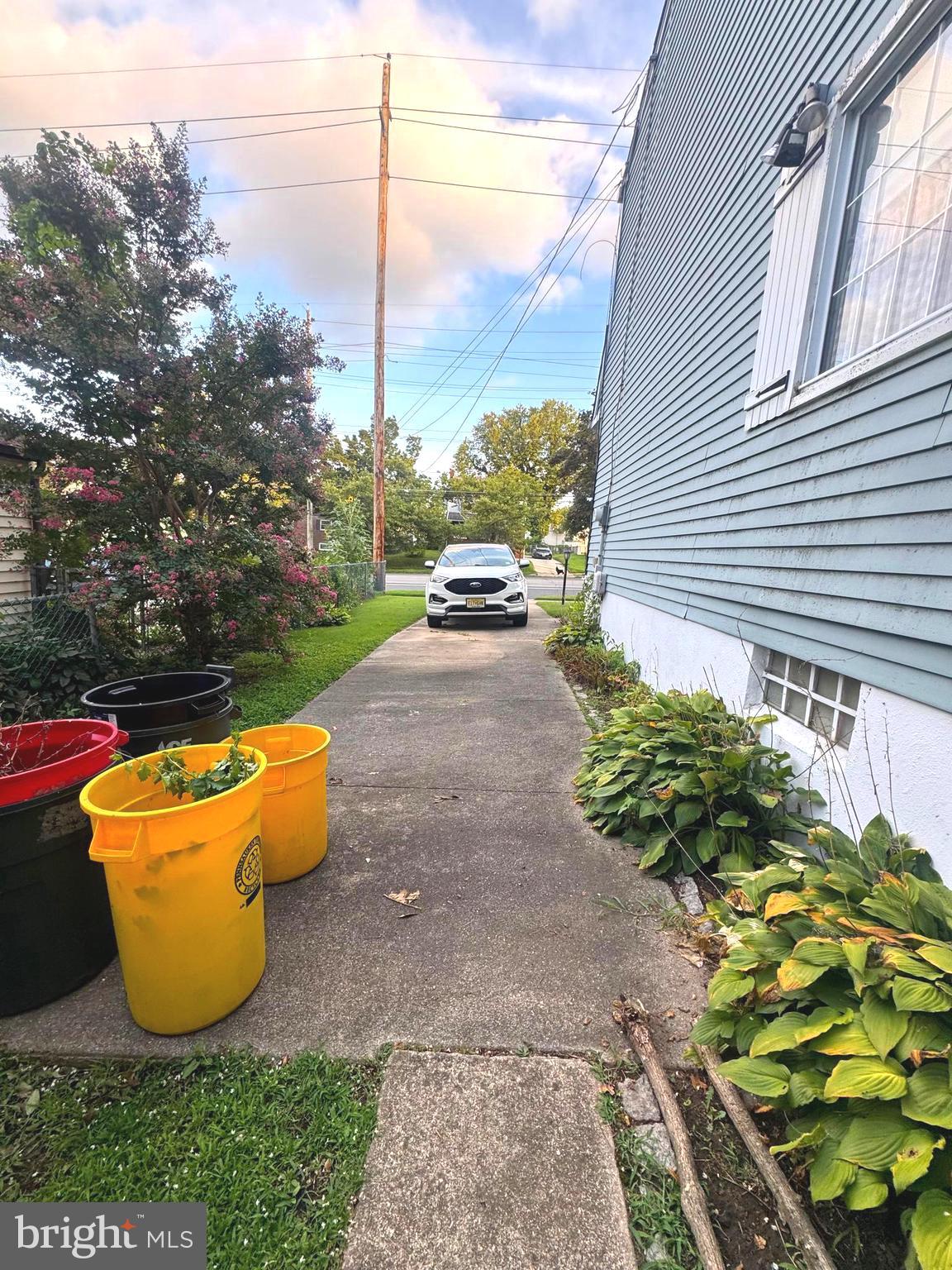 4741 River Road Pennsauken, NJ 08110 - Photo 7 of 26 a view of a backyard with garden and plants