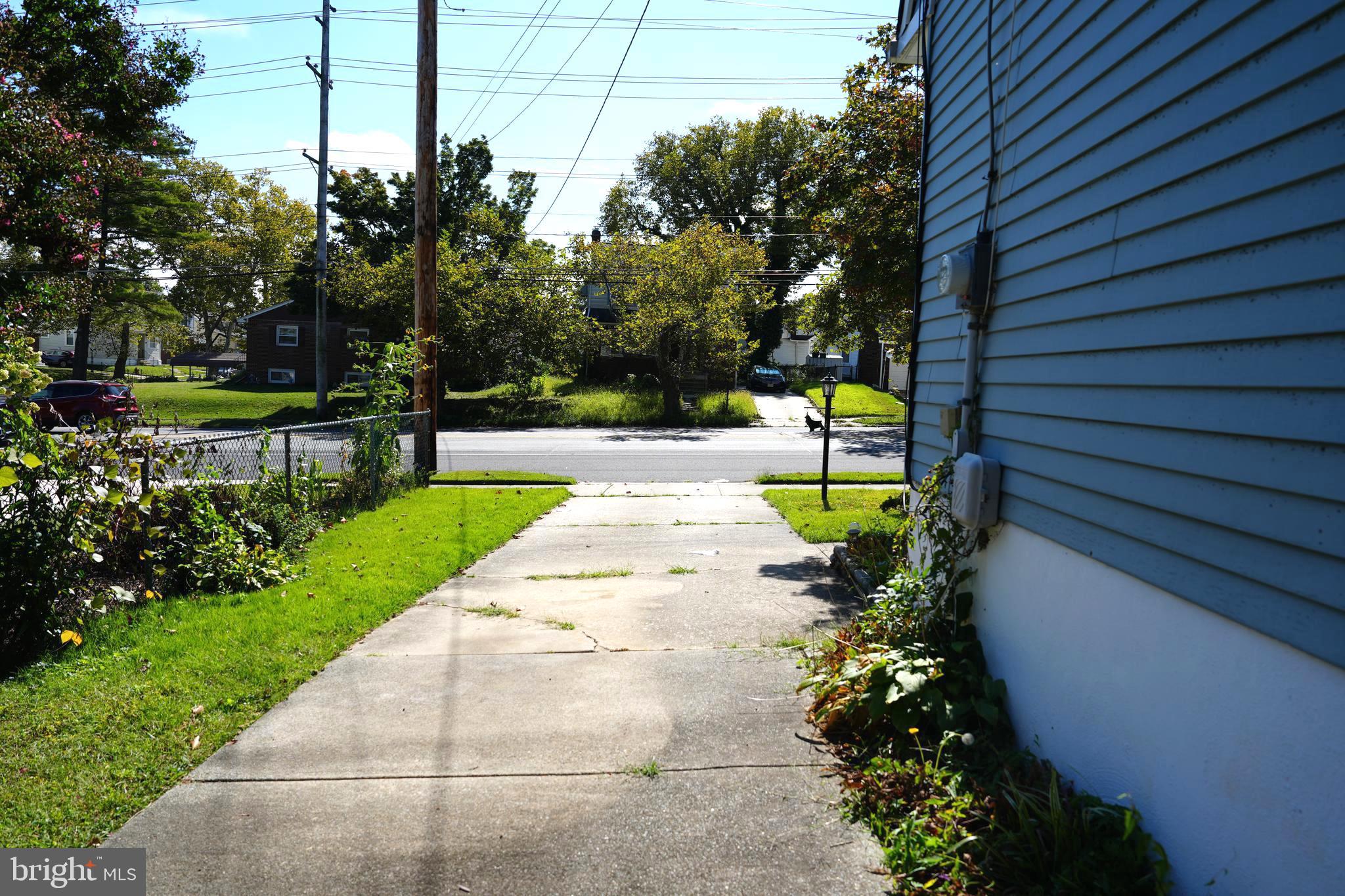 4741 River Road Pennsauken, NJ 08110 - Photo 8 of 26 a view of yard with swimming pool and trees