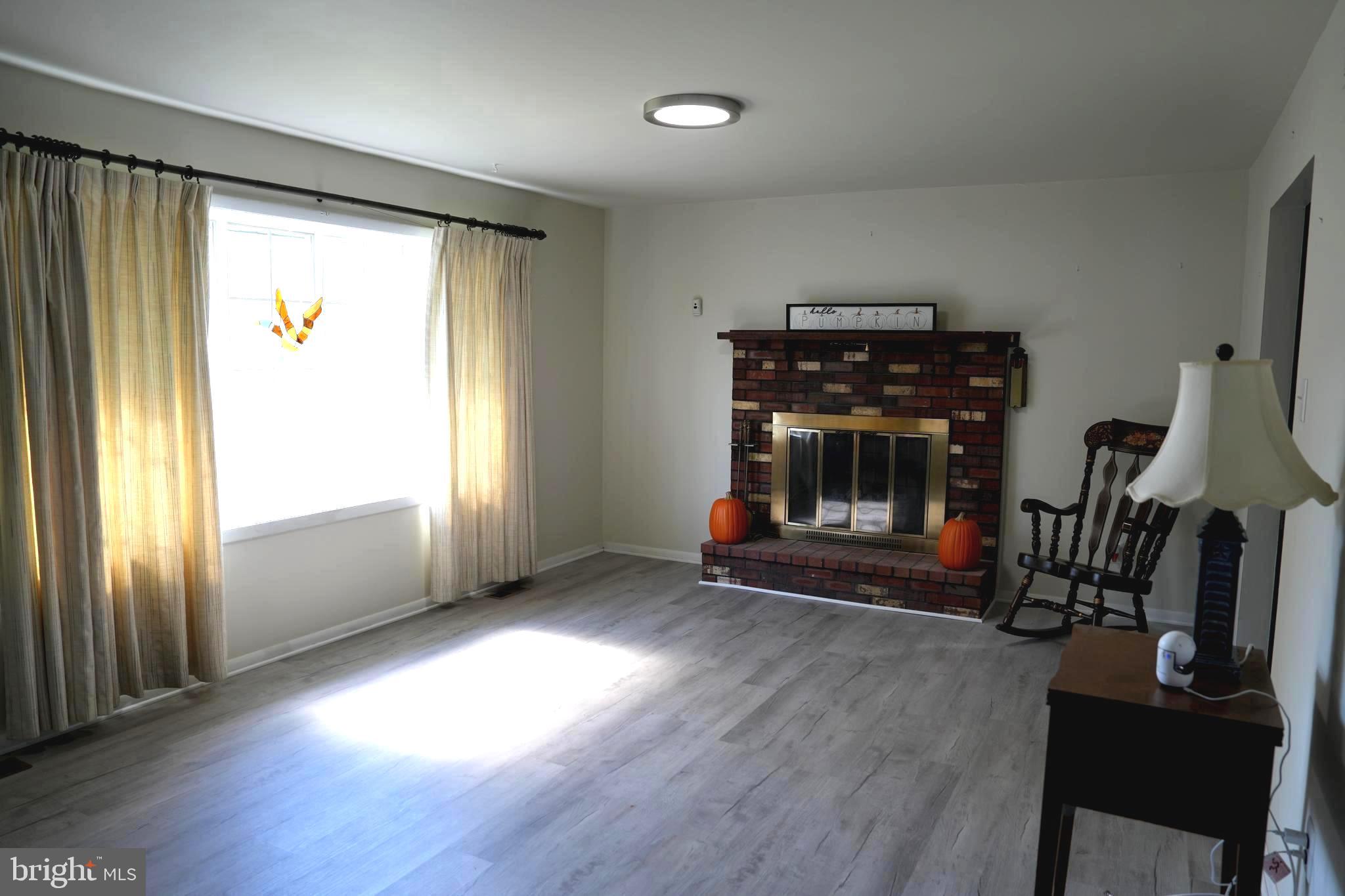 4741 River Road Pennsauken, NJ 08110 - Photo 9 of 26 a view of an empty room with wooden floor and a window