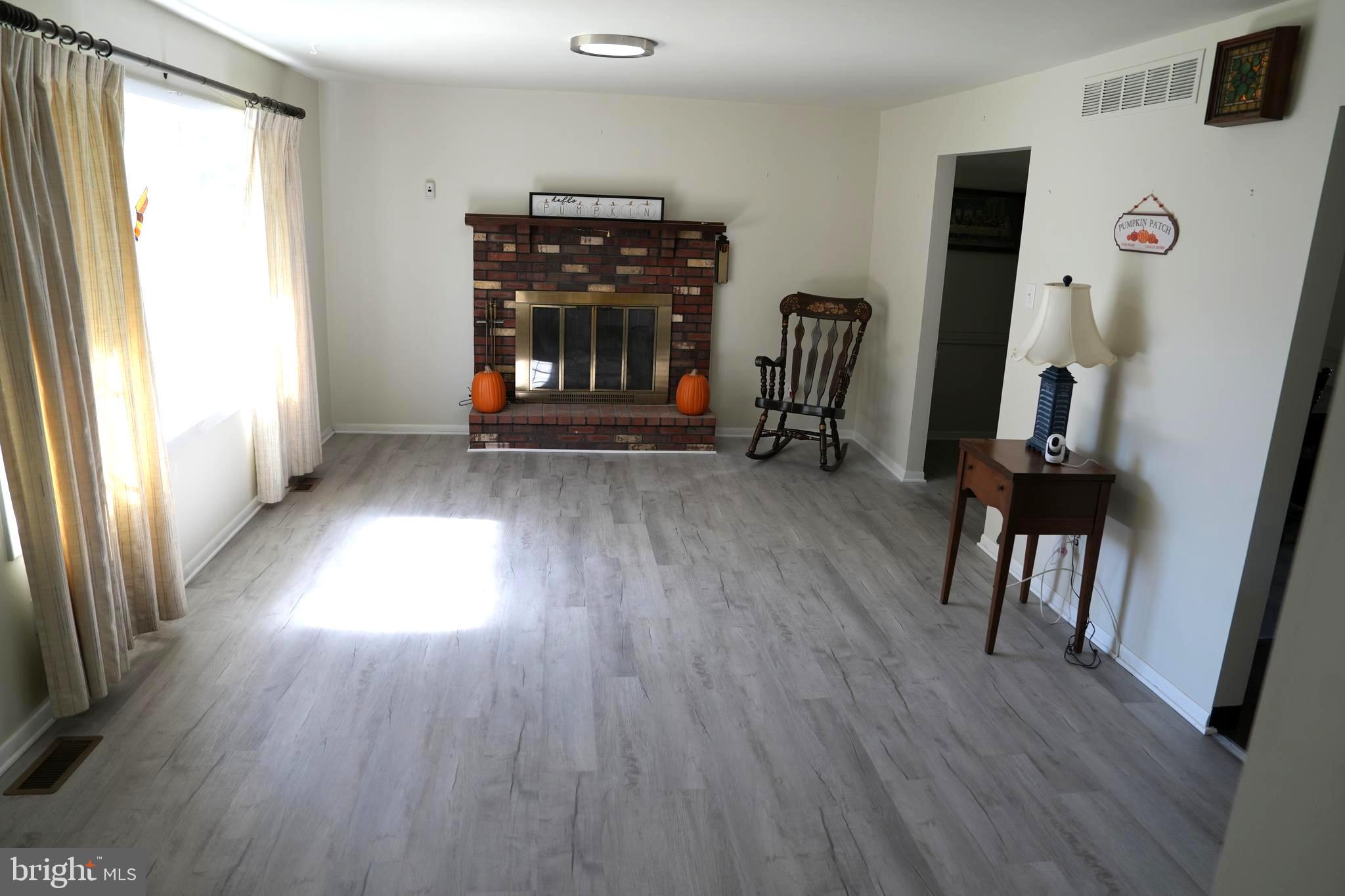 4741 River Road Pennsauken, NJ 08110 - Photo 10 of 26 a view of empty room with wooden floor and furniture