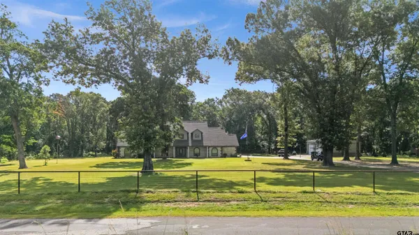 a view of swimming pool with trees