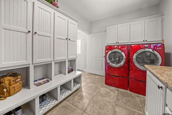 a view of room with washer and dryer