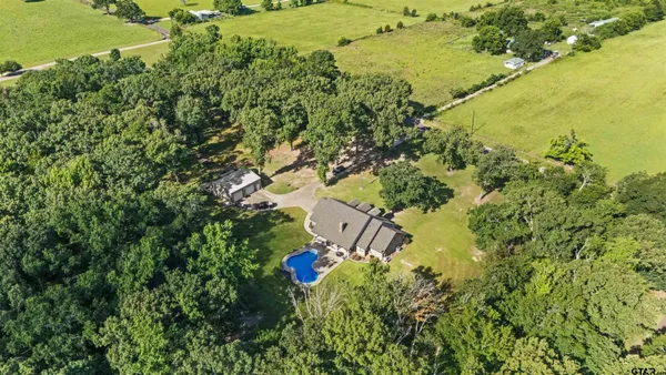 a view of a lake with a yard