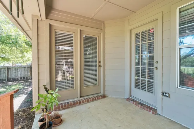 a view of balcony with a potted plant