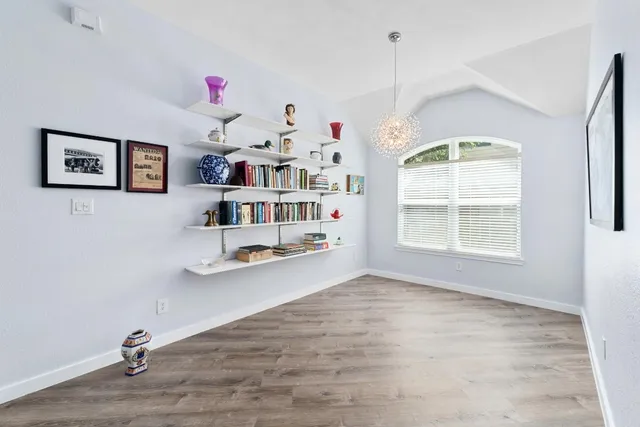 a room with toys and a large window