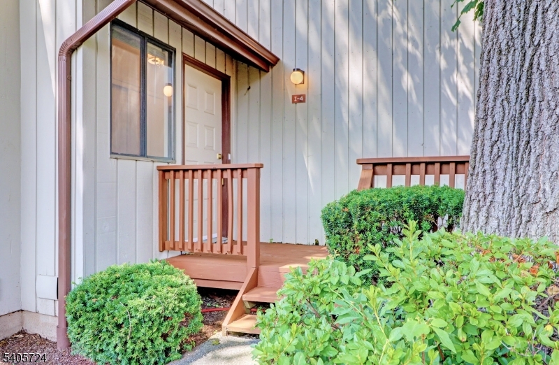 250 Ridgedale Avenue, Unit 4 Florham Park, NJ 07932 - Photo 2 of 24 a view of a porch with a garden
