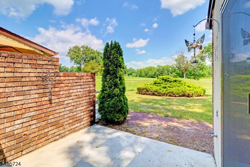 250 Ridgedale Avenue, Unit 4 Florham Park, NJ 07932 - Photo 23 of 24 a view of a yard with an outdoor space