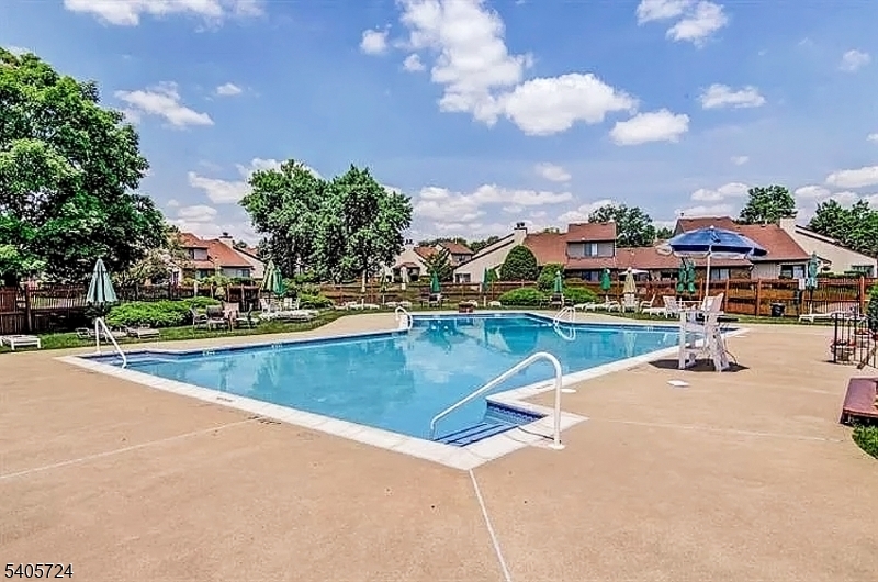 250 Ridgedale Avenue, Unit 4 Florham Park, NJ 07932 - Photo 24 of 24 a view of a lake with a house