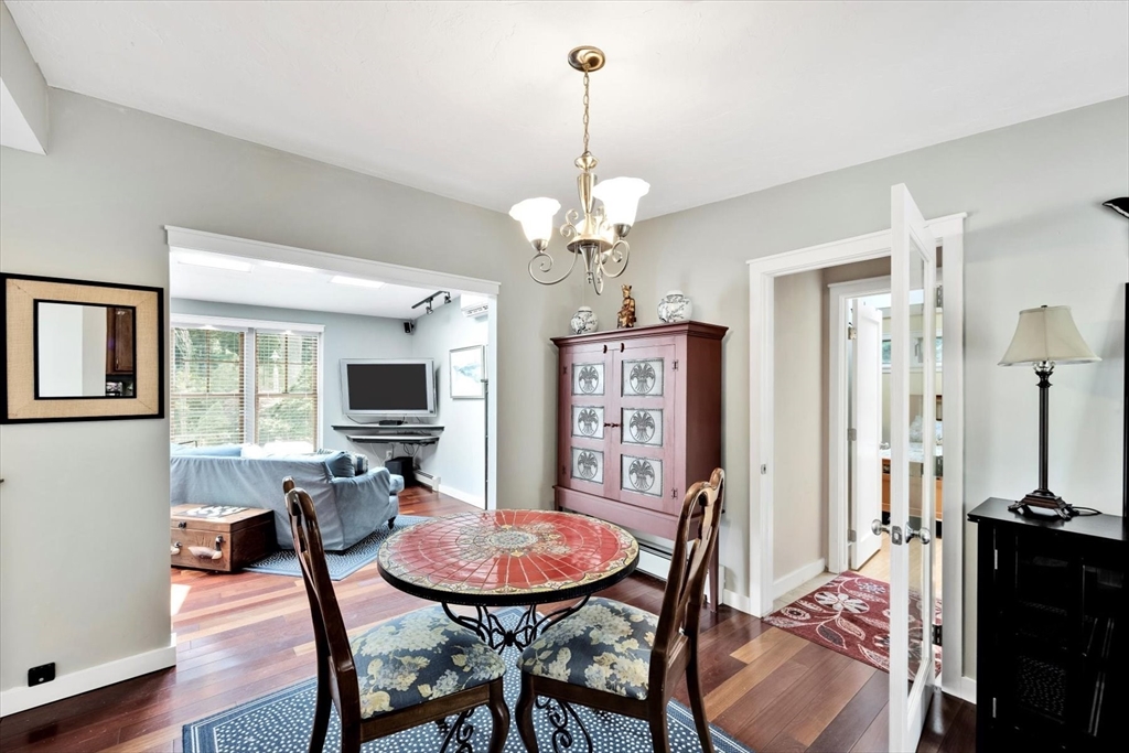 67 Cliff Road Bourne, MA 02532 - Photo 8 of 36 a view of a dining room with furniture