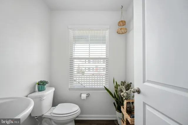 a view of staircase with white walls