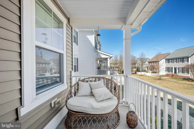 a view of balcony with furniture