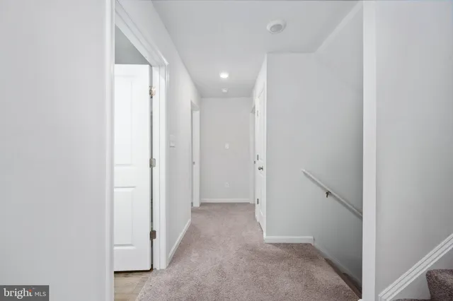 a front view of a house with a garage