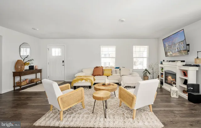 a dining room with a table and chairs