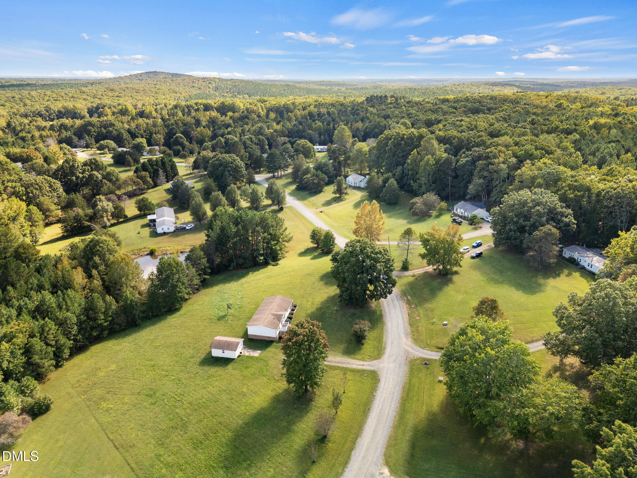 4551 Sugar Maple Road Oxford, NC 27565 - Photo 21 of 23 an aerial view of residential houses with outdoor space