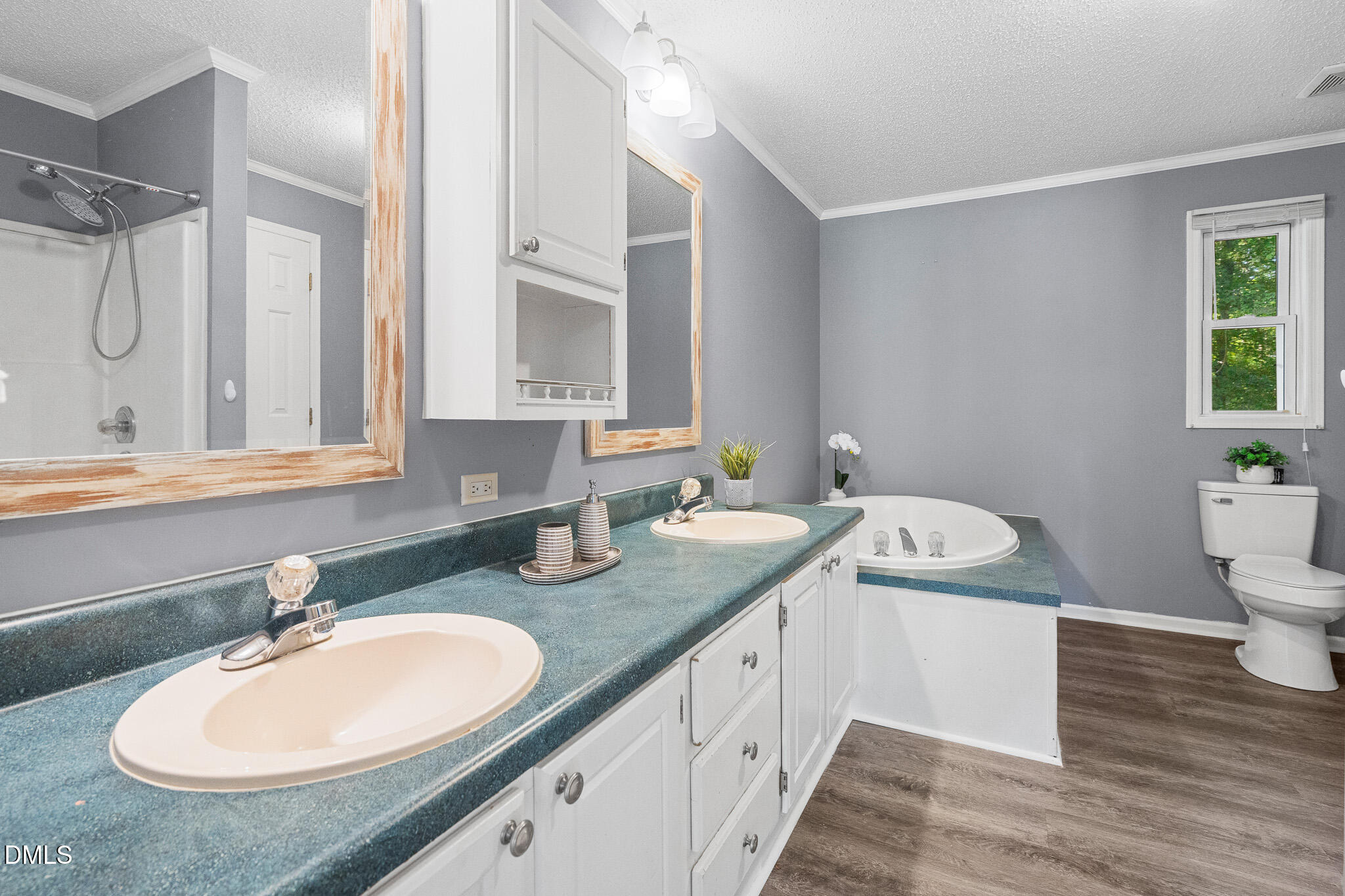 4551 Sugar Maple Road Oxford, NC 27565 - Photo 9 of 23 a bathroom with a granite countertop sink and a mirror