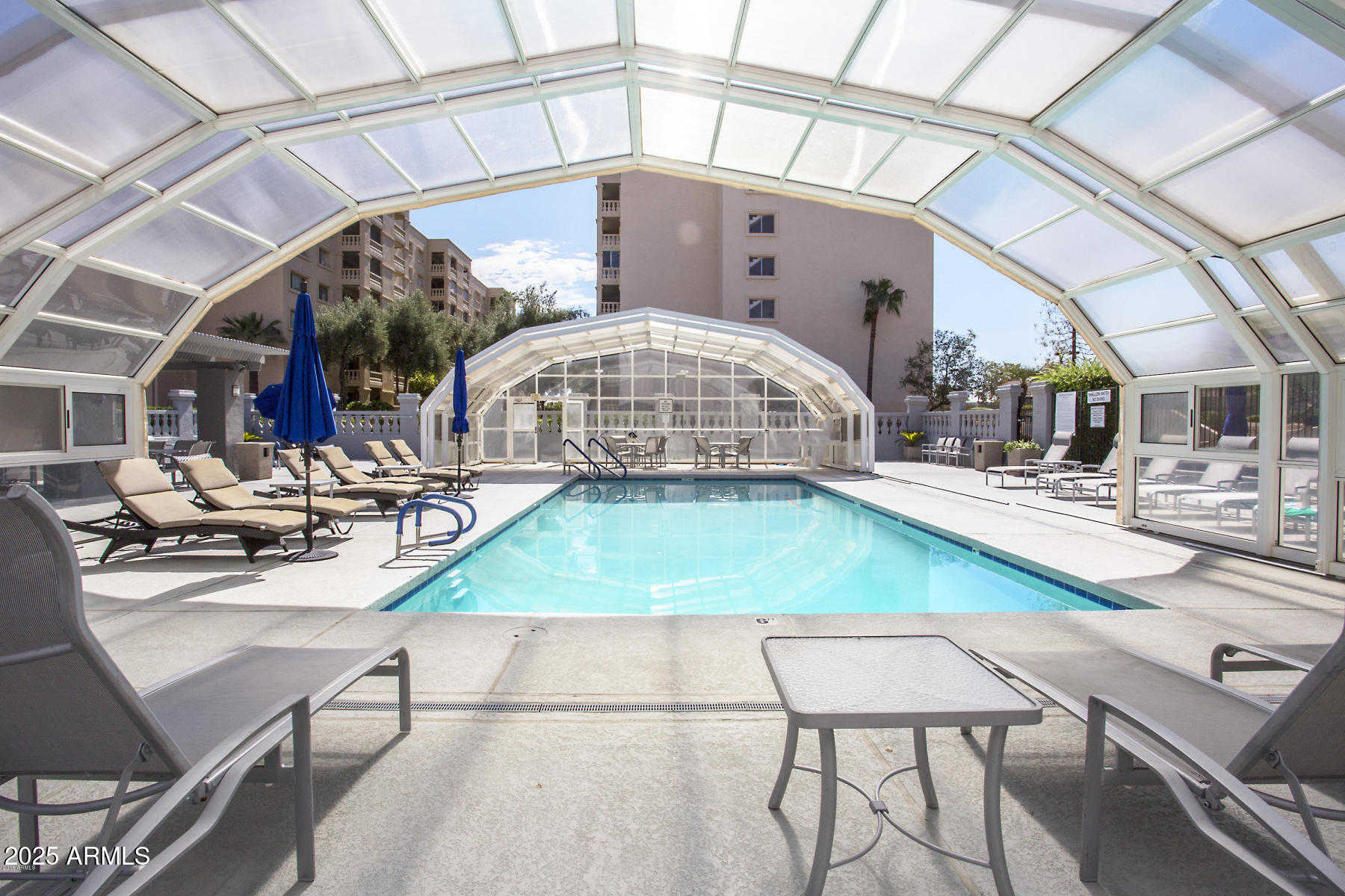 7920 East Camelback Road, Unit 203 Scottsdale, AZ 85251 - Photo 29 of 37 shadows covered pool