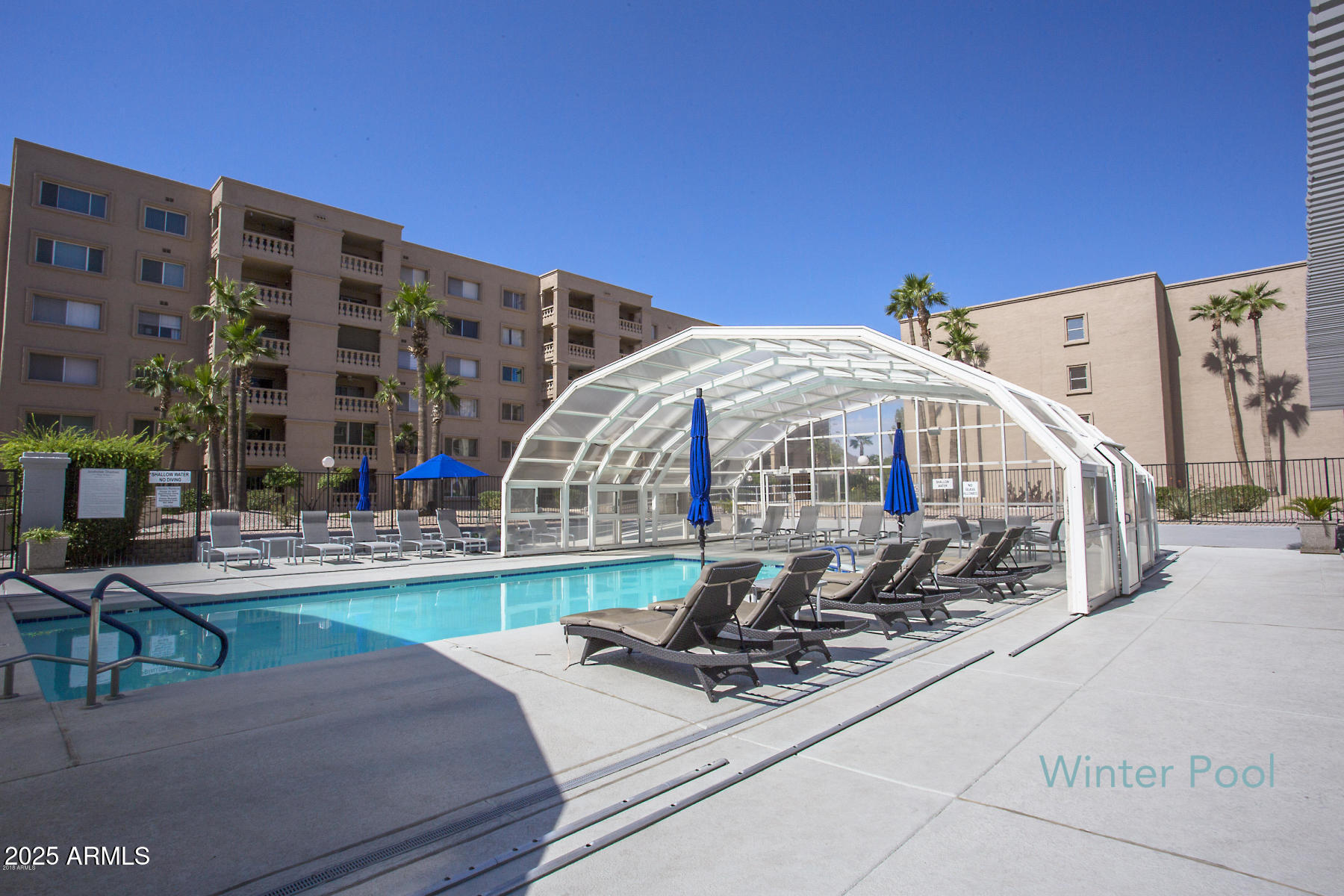 7920 East Camelback Road, Unit 203 Scottsdale, AZ 85251 - Photo 4 of 37 shadows covered pool 2