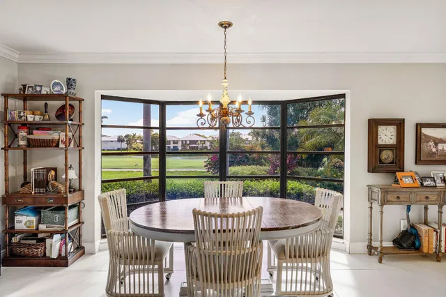 a kitchen with stainless steel appliances a stove sink microwave and cabinets