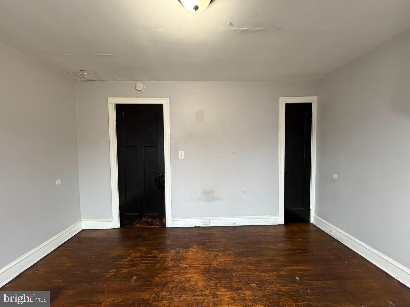 2606 Beryl Avenue Baltimore, MD 21205 - Photo 17 of 39 an empty room with closet and windows