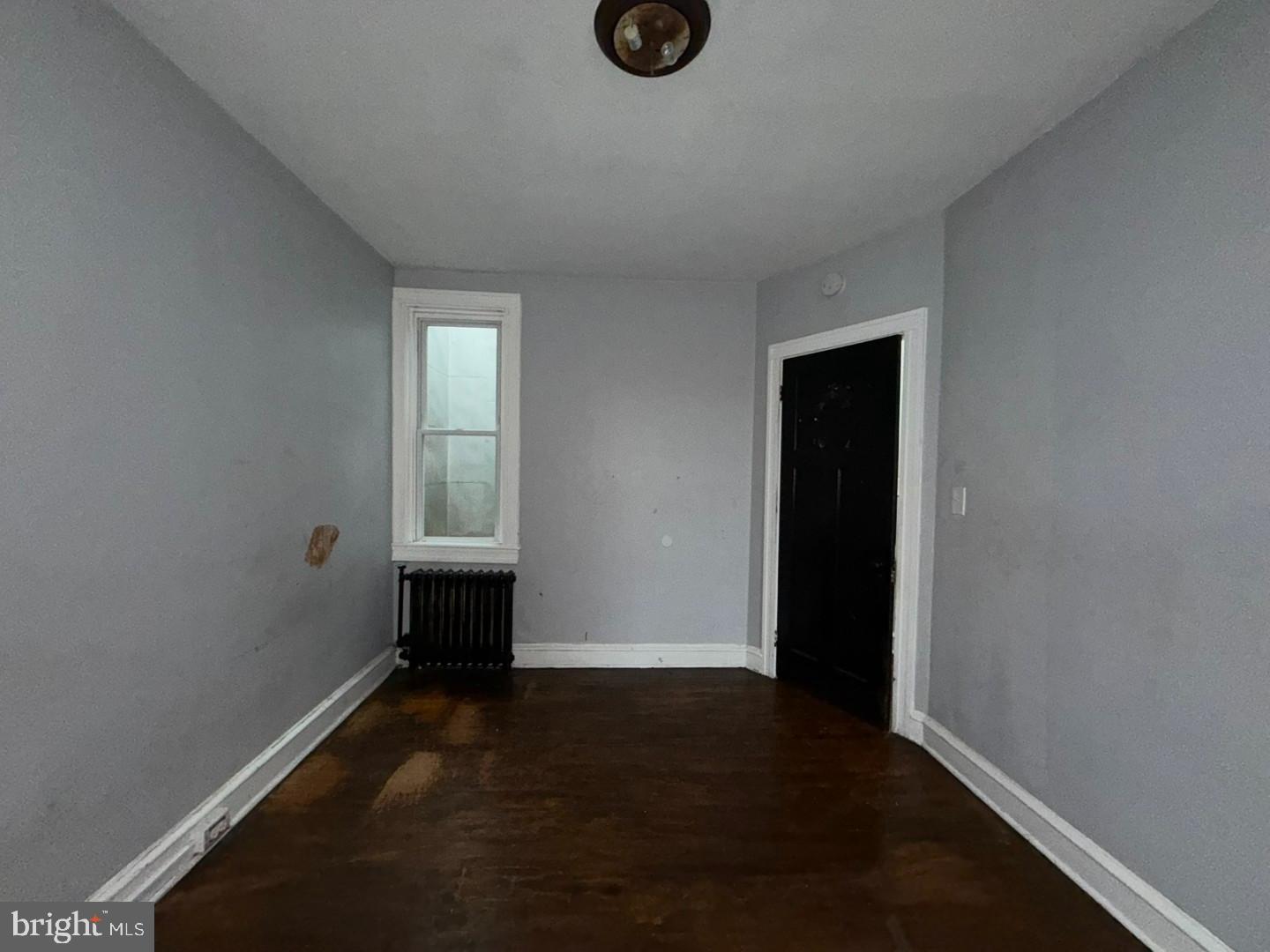 2606 Beryl Avenue Baltimore, MD 21205 - Photo 22 of 39 an empty room with windows