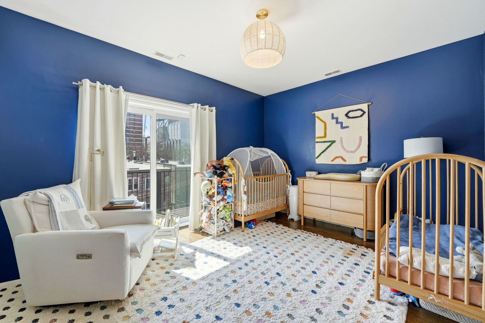 843 West Fletcher Street, Unit 3W Chicago, IL 60657 - Photo 24 of 45 a bedroom with furniture and a window