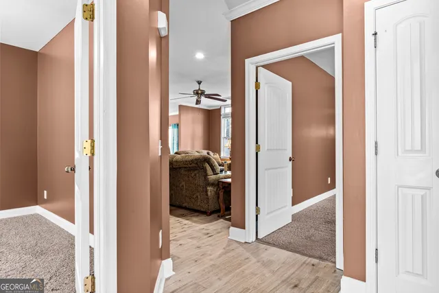 a view of a bedroom from the hallway