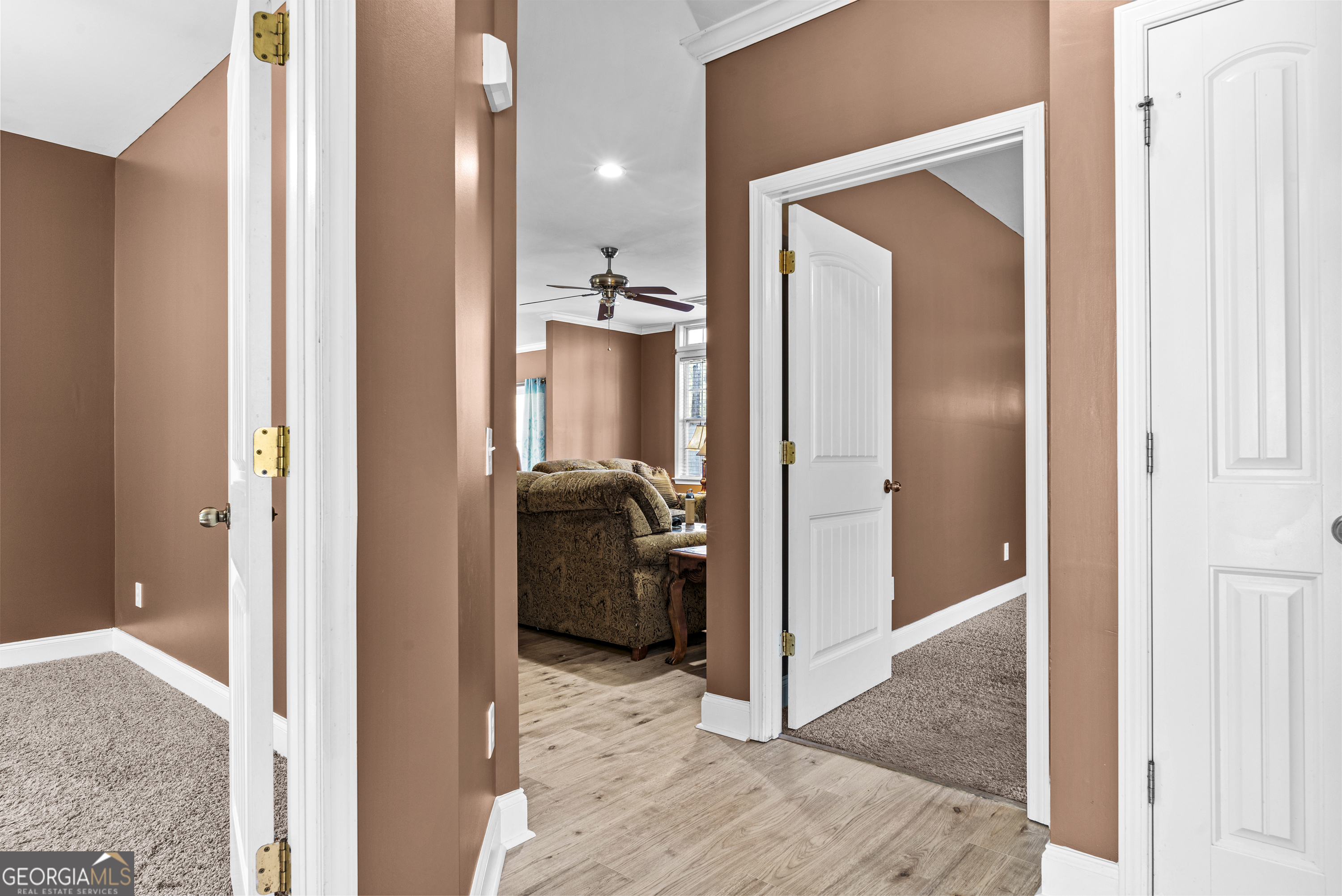 1141 Whispering Lakes Trail Madison, GA 30650 - Photo 21 of 40 a view of a bedroom from the hallway