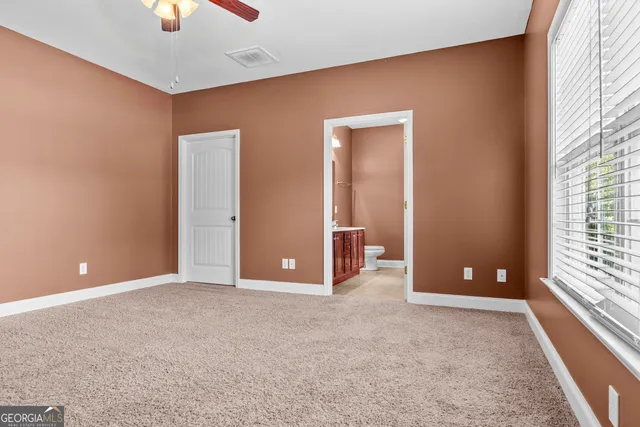 wooden floor and windows in an empty room