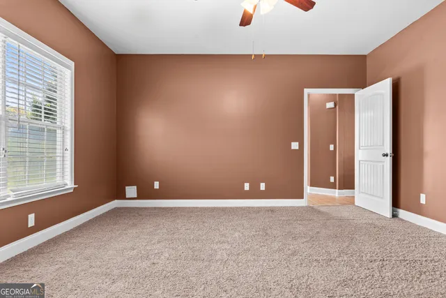 an empty room with a natural light