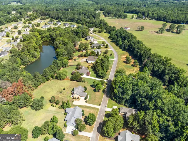 a view of a lake with a yard