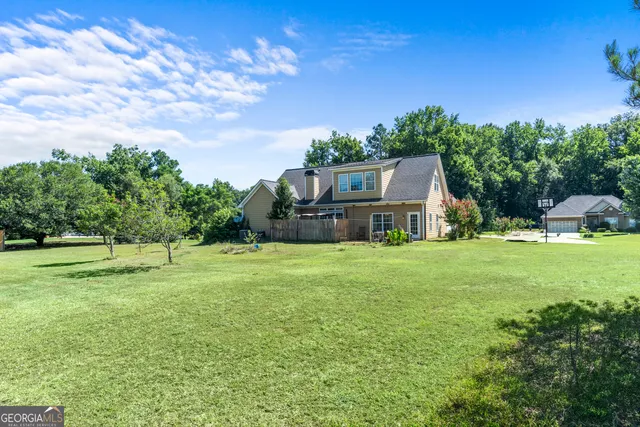 a house view with a garden space