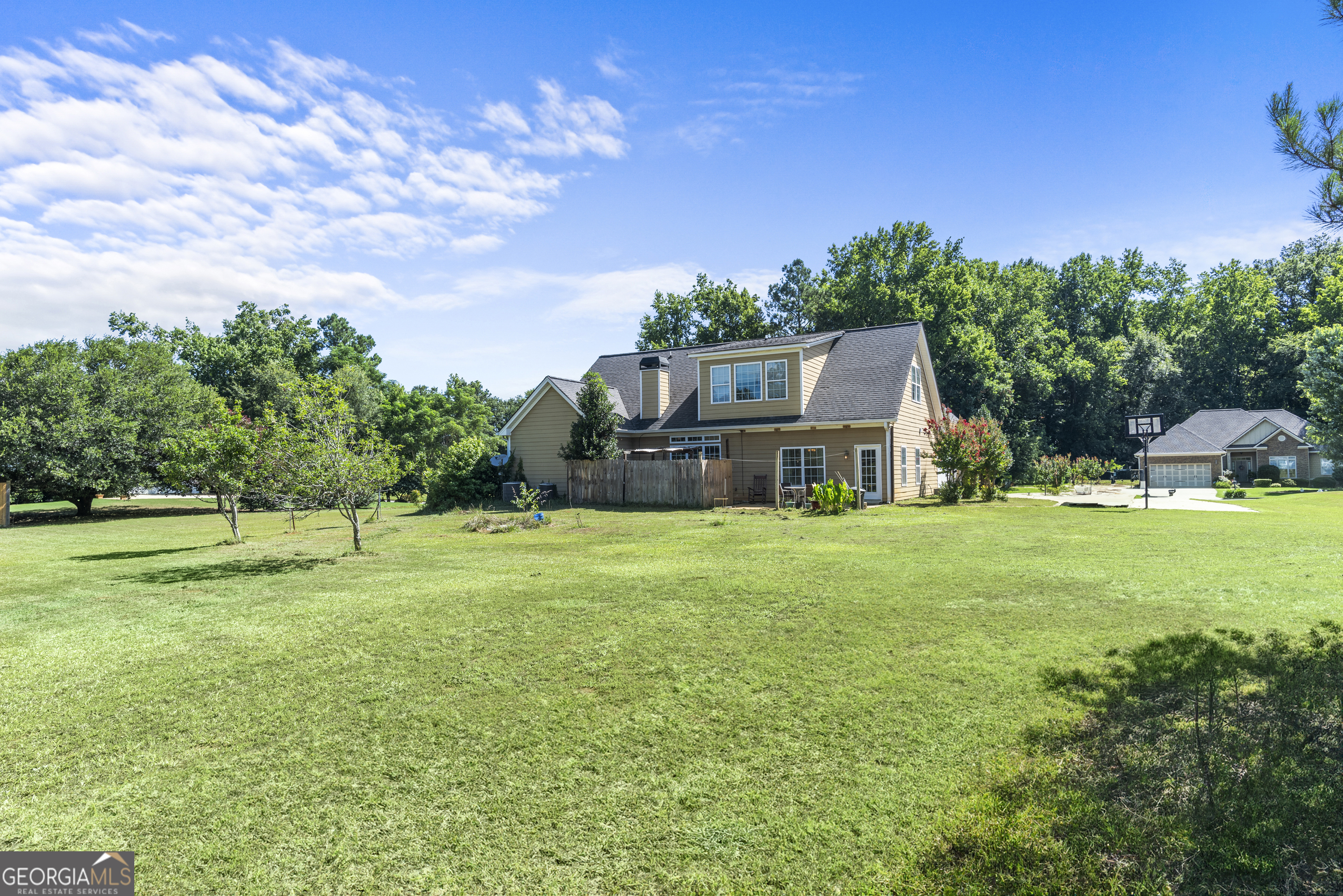 1141 Whispering Lakes Trail Madison, GA 30650 - Photo 37 of 40 a house view with a garden space