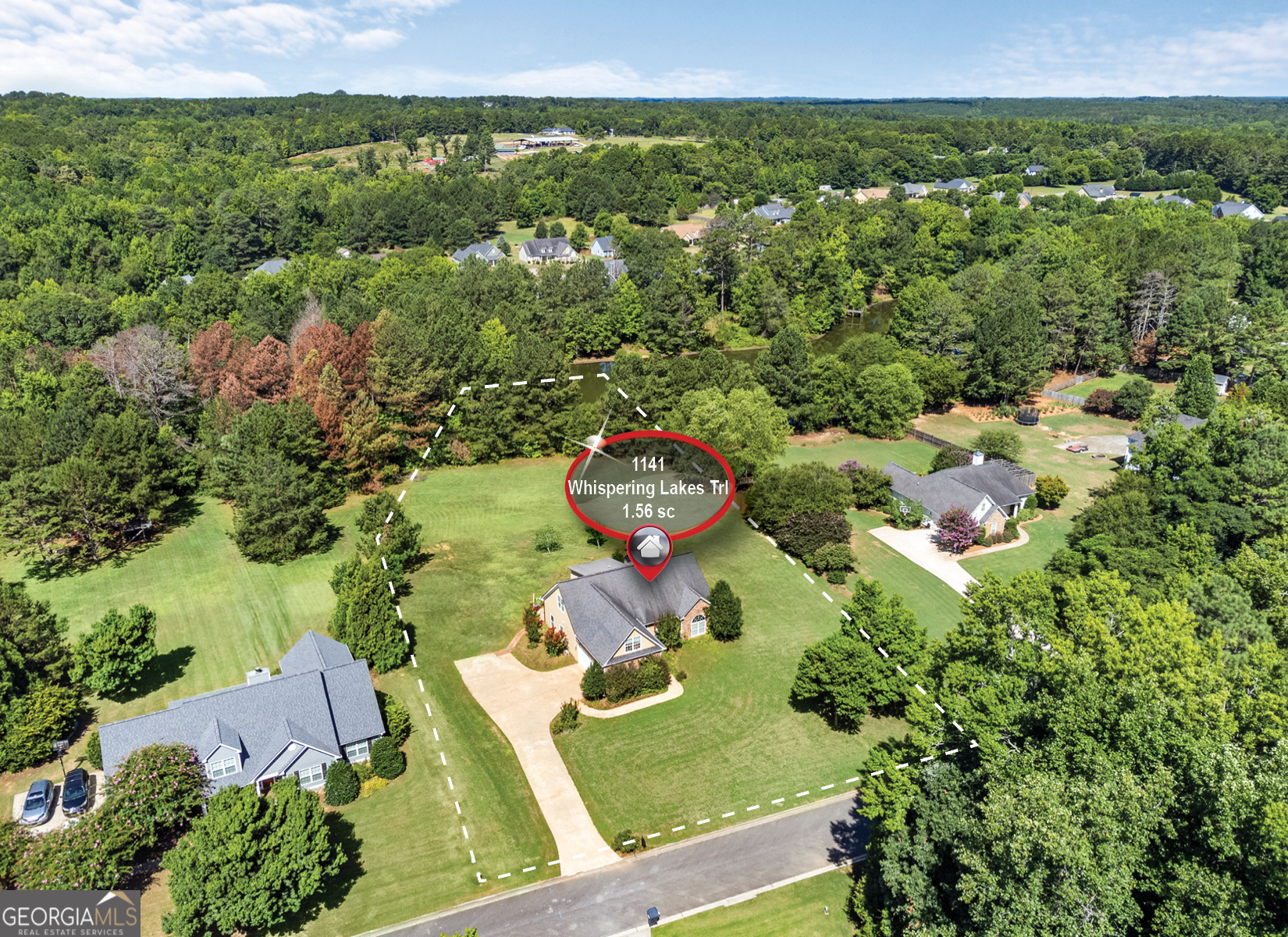 1141 Whispering Lakes Trail Madison, GA 30650 - Photo 40 of 40 an aerial view of a house with a yard