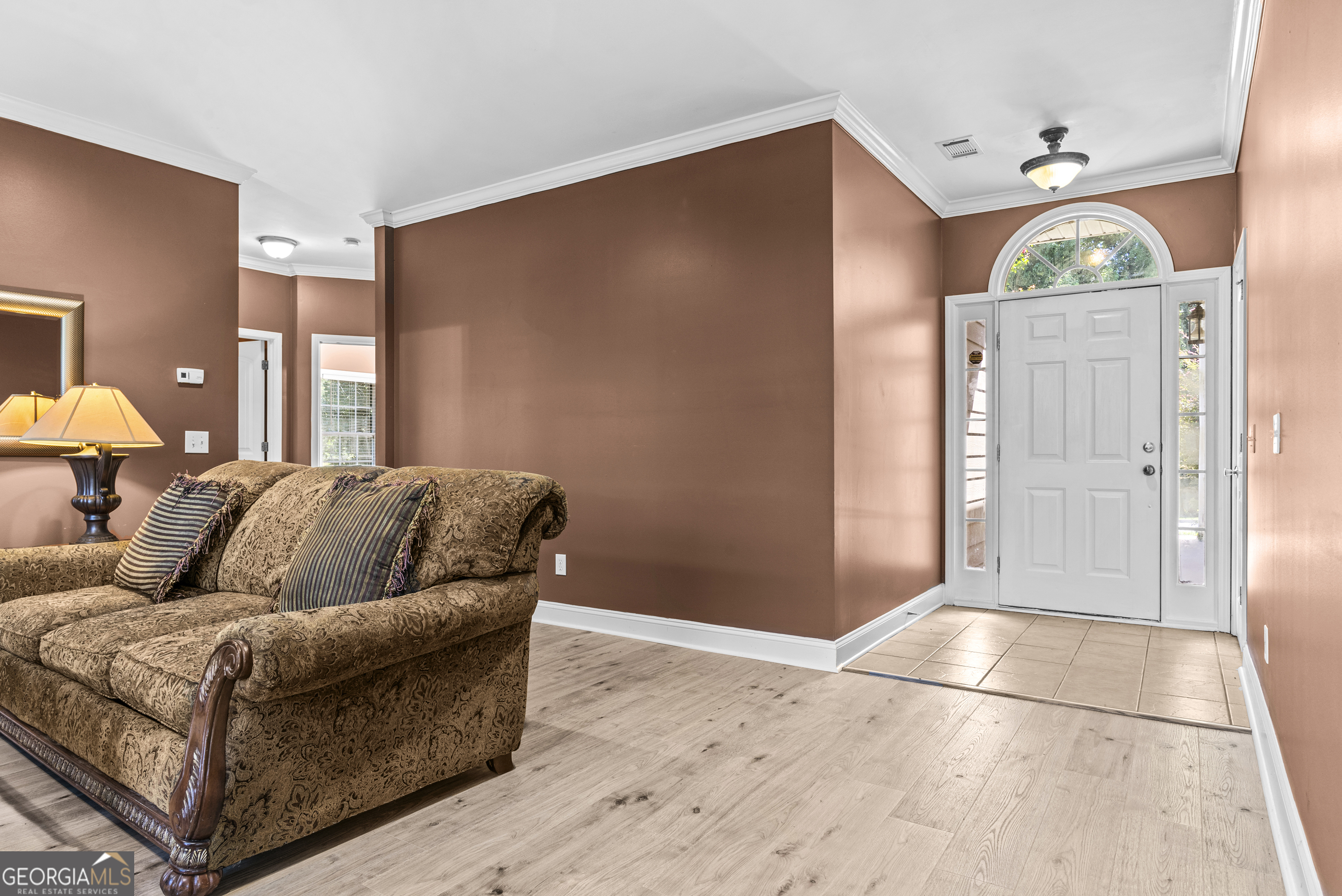 1141 Whispering Lakes Trail Madison, GA 30650 - Photo 5 of 40 a living room with furniture